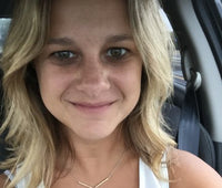 Kristin Candelore, girl smiling in a car selfie