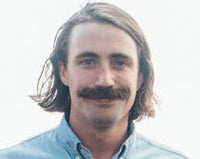 Bryan Holden, man with a mustache smiling