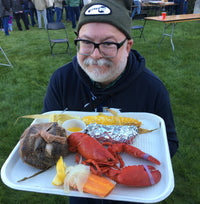 Bryan Petroff; man smiling with a lobster bake tray