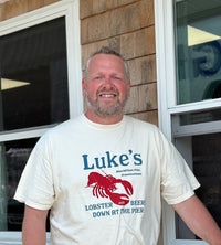 Kevin Bowen posing for a picture while wearing a Luke's shirt